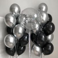 Прозрачный шар с надписью и фонтаны из чёрных и серебряных шаров