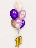 Маленькая цифра одиннадцать с фонтаном из шаров